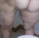 One of our users records his large wife taking a soft, runny shit into a toilet. She spreads her ass cheeks to show us the mess on her butt, and finished mess in toilet bowl is shown. About a minute.